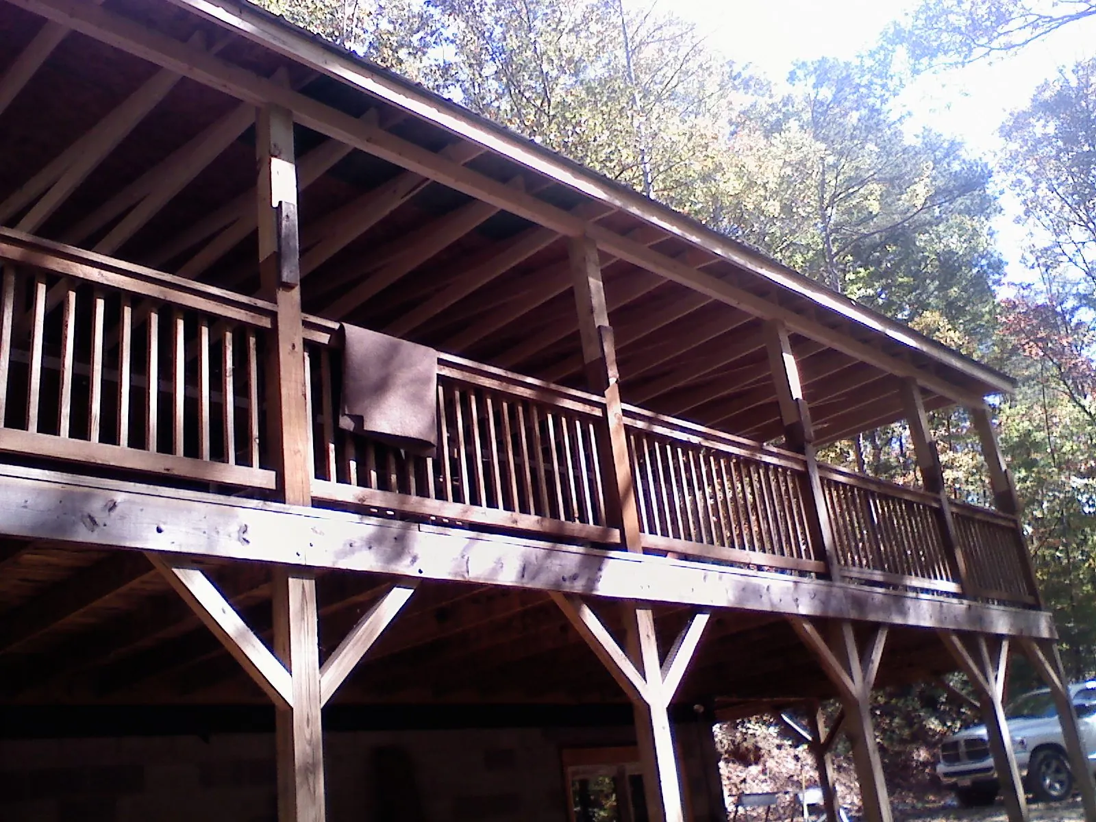 Timber framing under a new elevated porch and deck — Roof Leak Repair in Parker City by Roofing Brothers